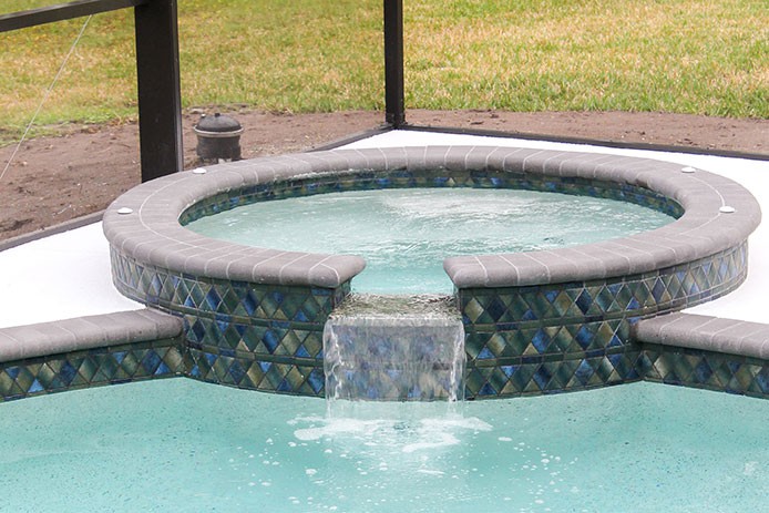 round hot tub with falls